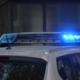 A police car with blue lights flashing